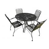WROUGHT IRON TABLE AND 4 CHAIRS