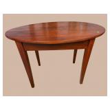ANTIQUE WALNUT OVAL WRITING TABLE