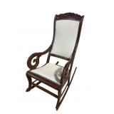 MAHOGANY UPHOLSTERED ROSE CARVED ROCKER