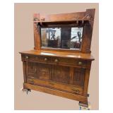 HEAVY CARVED LARGE OAK BUFFET WITH MIRROR