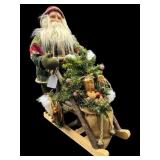 LARGE SANTA FIGURE ON WOODEN SLEIGH