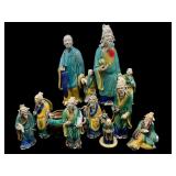 LOT OF 9 ORIENTAL MUD FIGURES