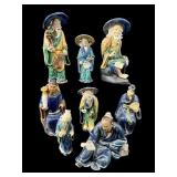 LOT OF 8 ORIENTAL MUD FIGURES