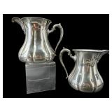 2 SILVERPLATE ORNATE WATER PITCHERS