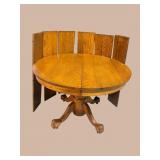 ROUND OAK CLAWFOOT TABLE W 6 ORIGINAL LEAVES