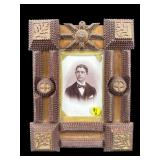 ANTIQUE TRAMP ART FRAME WITH PORTRAIT OF YOUNG