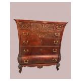 HEAVY CARVED KETTLE FORMED MAHOGANY TALL CHEST
