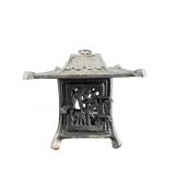 CAST IRON PAGODA CANDLE HOLDER