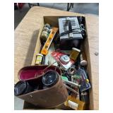 BINOCULAR AND BATTERY CHARGER LOT