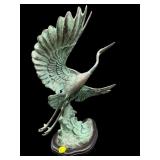 CHINESE BRONZE HERON IN FLIGHT ON BASE