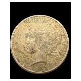 1922 S AU PEACE SILVER DOLLAR