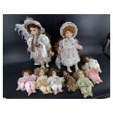 9 PIECE LOT OF PORCELAIN DOLLS