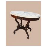 CHERRY MARBLE TOP OVAL CARVED TABLE