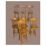 7 OAK CARVED SWIVEL BARSTOOLS