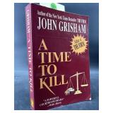 SIGNED JOHN GRISHAM PAPERBACK 