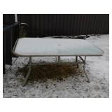 GLASS TOP PATIO TABLE   60 X 38 X 28'