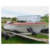 LEAVENS BOAT WITH EVINRUDE MOTOR