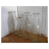 4 MILK BOTTLES