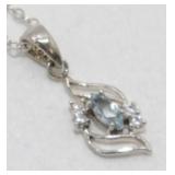 Sterling Silver, Blue Topaz and White Stone