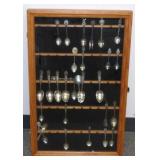 ** Souvenir Spoons in Display Case
