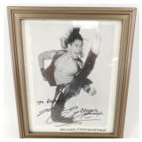 Autographed Picture of Michael Chaturantabut -