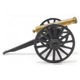 Old Brass Miniature Cannon on a Cast Metal Frame