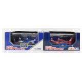 Pair of Racing Champions Pit Stop Show Case