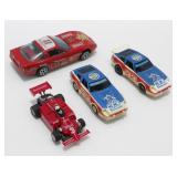 Three Budweiser Slot/Race Cars plus a Bburago