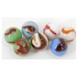 Group of Seven Vintage Swirl and Cat's Eye Glass