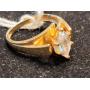 14k gold ring with clear stone.  Look at the