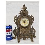 Ansonia .etal case clock , wind up mechanism look