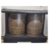 Barrel Bar measures 63"w 26"d 43"h , vinyl padded