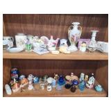 Salt shakers, pin holders. Miniature dog on