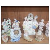 Porcelain figurines.   Faux click with wine