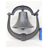 Cast iron bell with yoke.  Look at the photos for