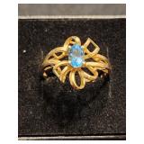 10 K gold ring with Aqua Zircon oval stone floral