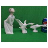 3 Lladro figurines. Girl Kissing and 2 geese.