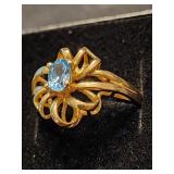 10 K gold ring with Blue Zircon oval stone.
