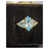 10K gold ring with 3 Topaz stones.  Estate
