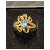 10 K Gold ring with Aqua Zurcon stone.   Floral