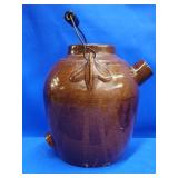 Stoneware batter jug with wire bail.