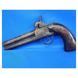 Antique Double barrel percussion cap pistol.