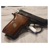 Beretta Model 21 A .22 LR wood grips. Original