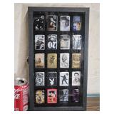 20  Zippo Collectible Lighters in a case all