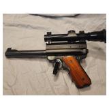 Ruger. 22 Cal Taget Pistol has Leupold scope.