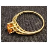 14 K gold ring with citrine colored stone.