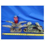 4 vintage boat cleats.  Various ages and makers.