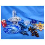 Art glass grapes and leaves, blue art glass bowl.