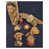 7 Bosson Heads, 2 mounted on wood, 5 loose  Sea