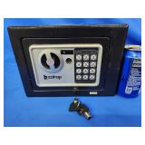 Zokop key operated safe.  6.5" H x 9" W x 6.5" D.